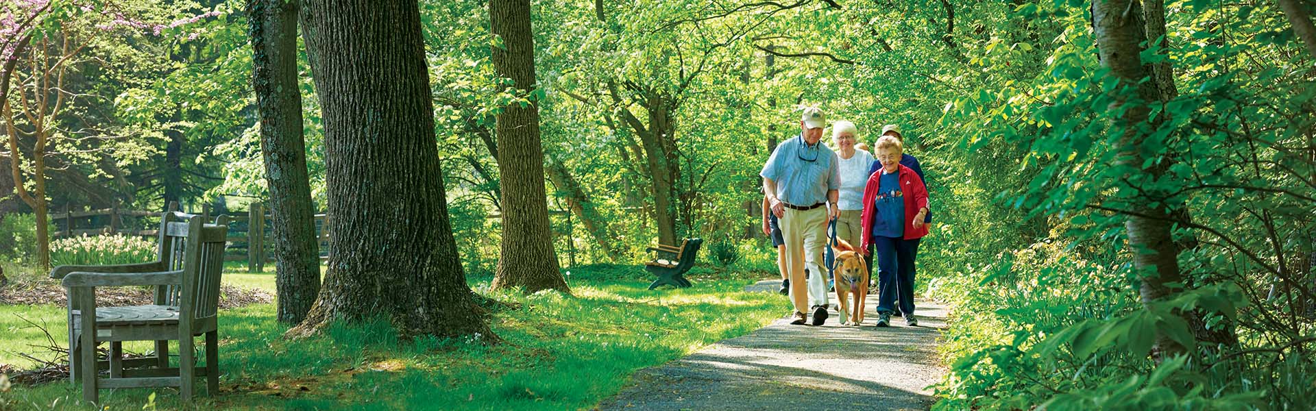 Residents walking on one of the many paths on the Foulkeways expansive campus